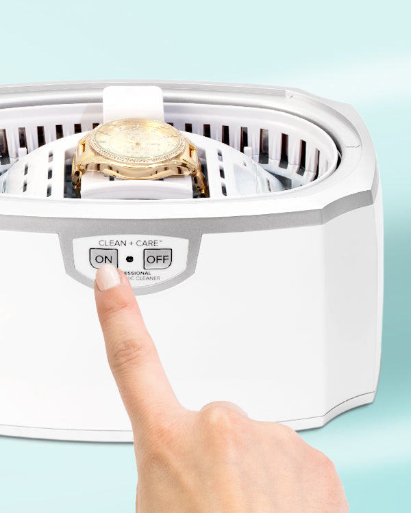 Ultrasonic Cleaner in use, cleaning a gold watch