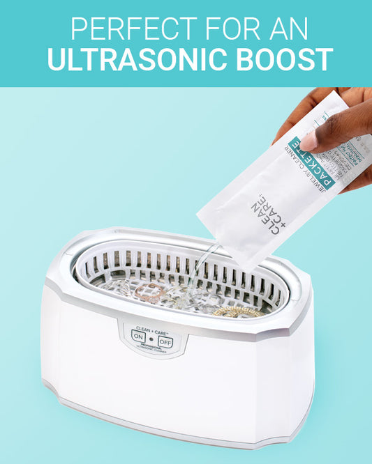 CLEAN+CARE Jewelry Cleaner Packette in use as an ultrasonic boost.