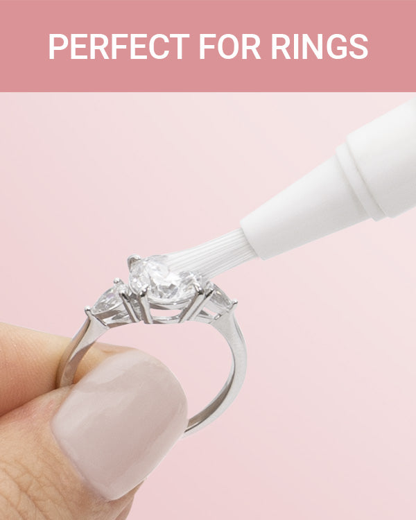 CLEAN+CARE Sparkle + Shine® Jewelry Cleaning Stick in-use cleaning between diamond ring settings