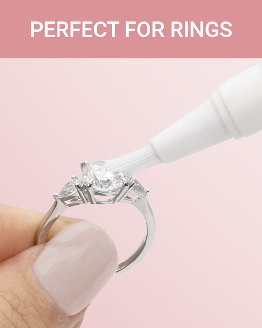CLEAN+CARE Sparkle + Shine® Jewelry Cleaning Stick in-use cleaning between diamond ring settings