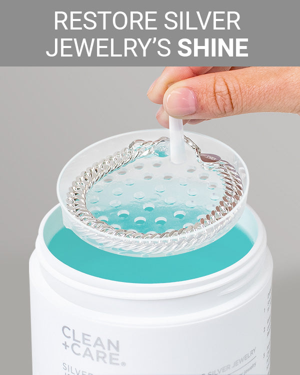 CLEAN+CARE Silver Jewelry Cleaner in-use with silver bracelet being cleaned