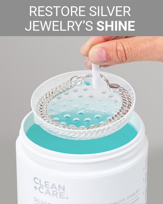 CLEAN+CARE Silver Jewelry Cleaner in-use with silver bracelet being cleaned