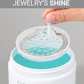 CLEAN+CARE Silver Jewelry Cleaner in-use with silver bracelet being cleaned