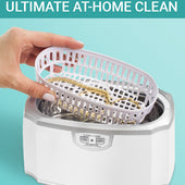 CLEAN+CARE Ultrasonic Cleaner in-use with jewelry in included soaking basket 