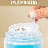 CLEAN+CARE Gentle Jewelry Cleaner in-use on an opal ring