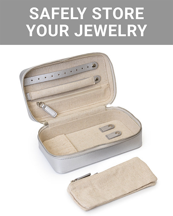The CLEAN+CARE Jewelry Storage Case open, displaying compartments that safely separate jewelry and a removable pouch.