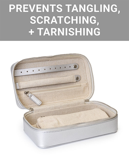 The CLEAN+CARE Jewelry Storage Case open, showing the removable pouch securely stored inside main compartment.