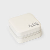 The CLEAN+CARE Jewelry Travel Case closed with secure zipper, showcasing its sleek, compact size for travel.