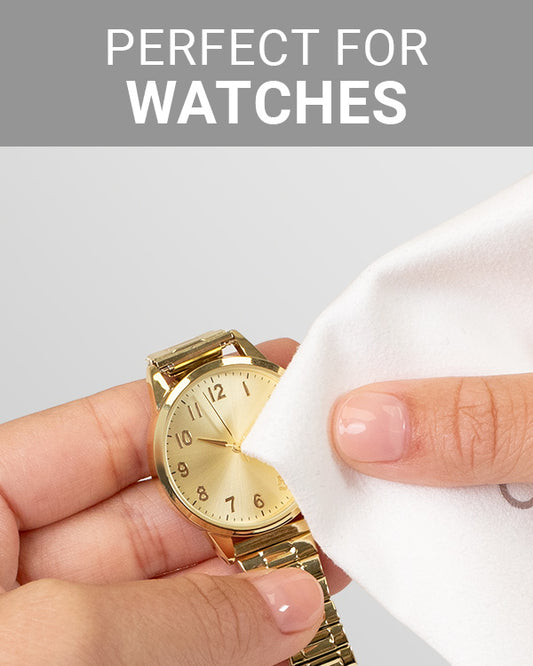 CLEAN+CARE Microfiber Cleaning Cloth in-use on a gold watch