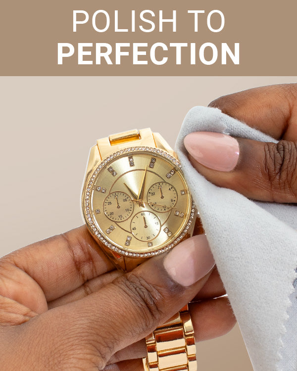 CLEAN+CARE Professional Polishing Cloth in-use on a gold watch
