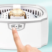 Ultrasonic Cleaner in use, cleaning a gold watch